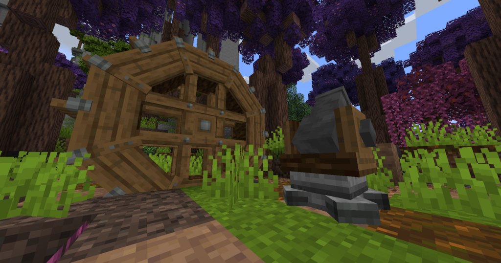 A water wheel and a cannon from the StaTech Industry Modpack.