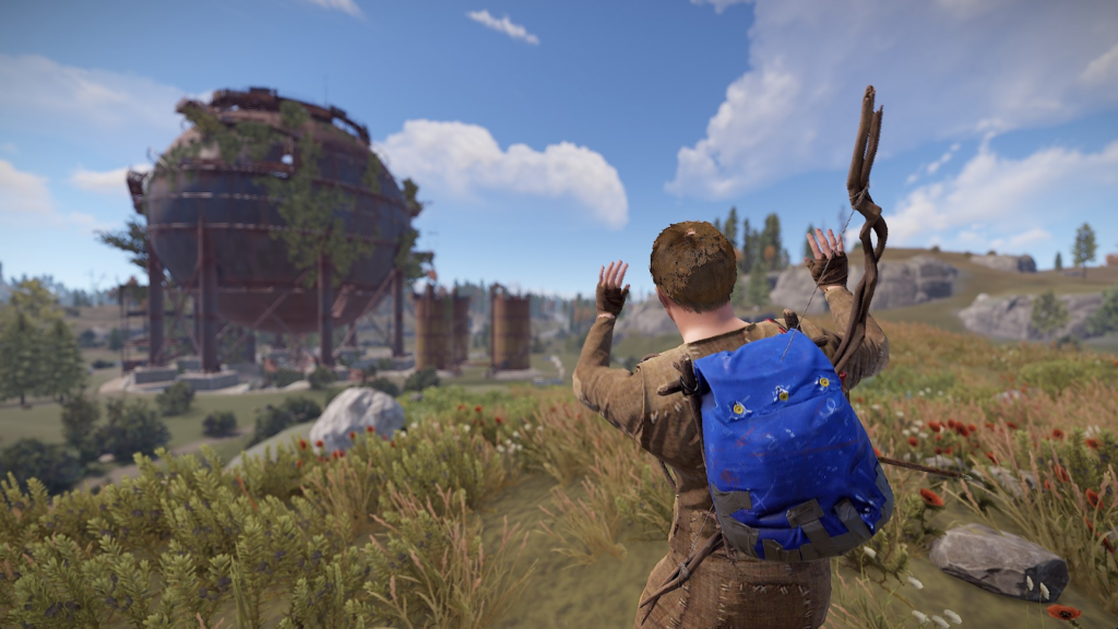 rust player raising both hands in the air