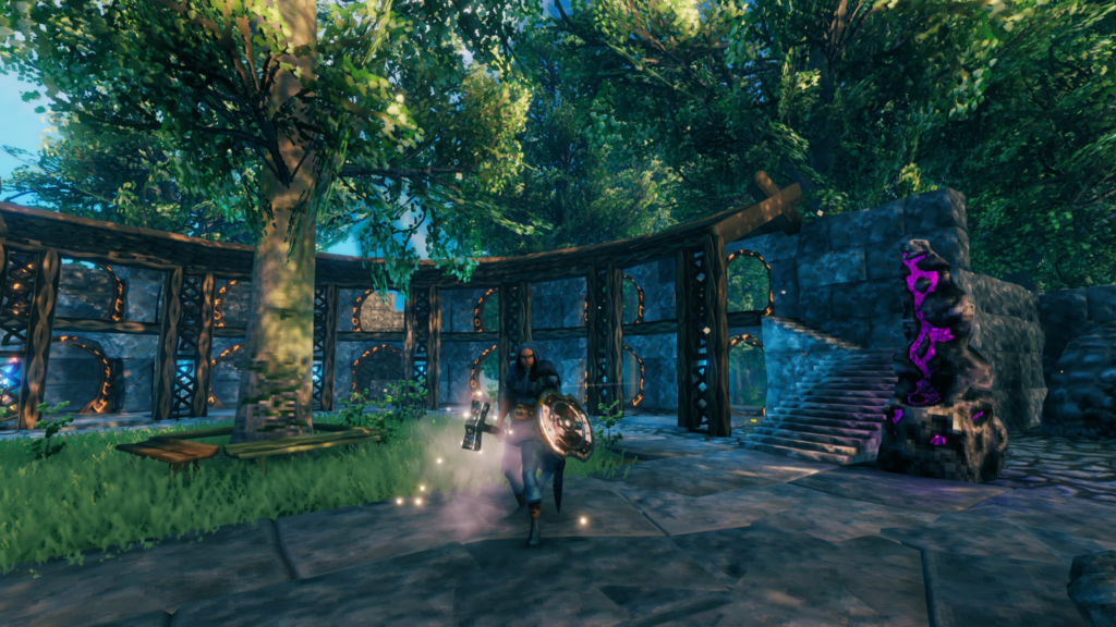 a valheim player in his base holding a hammer and a shield