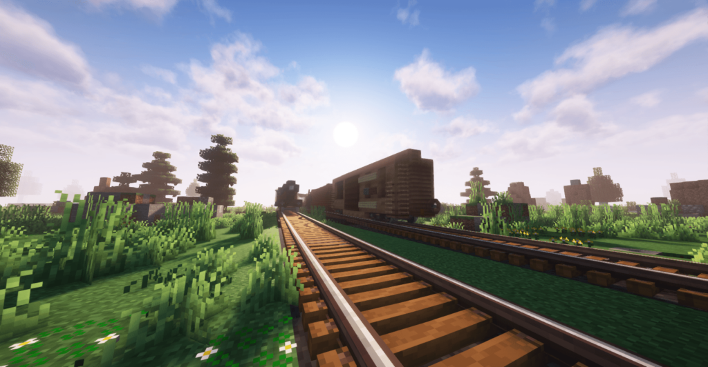 A railroad with a train from the All of Create modpack