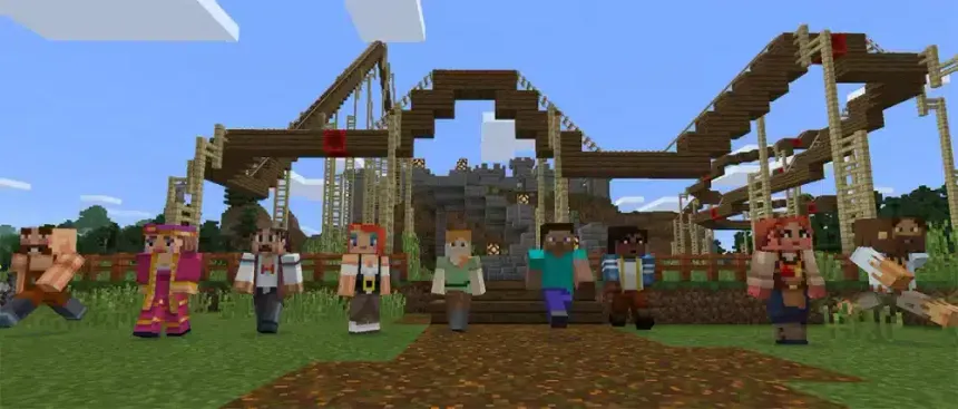 Nine players walking away from a Minecraft roller coaster they built