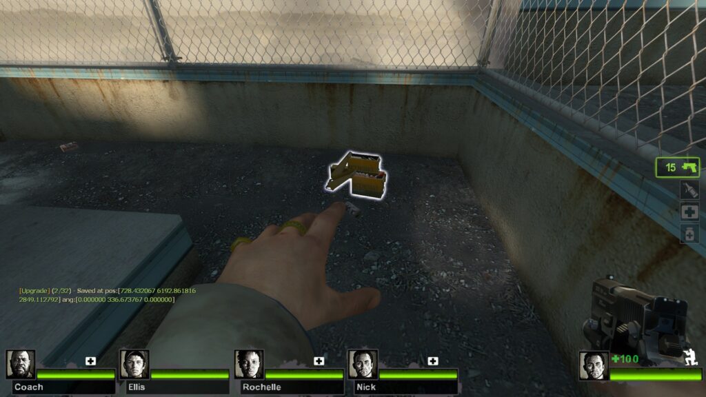 In-game screenshot of a survivor pointing at a newly spawned Incendiary Ammo upgrade box on the ground