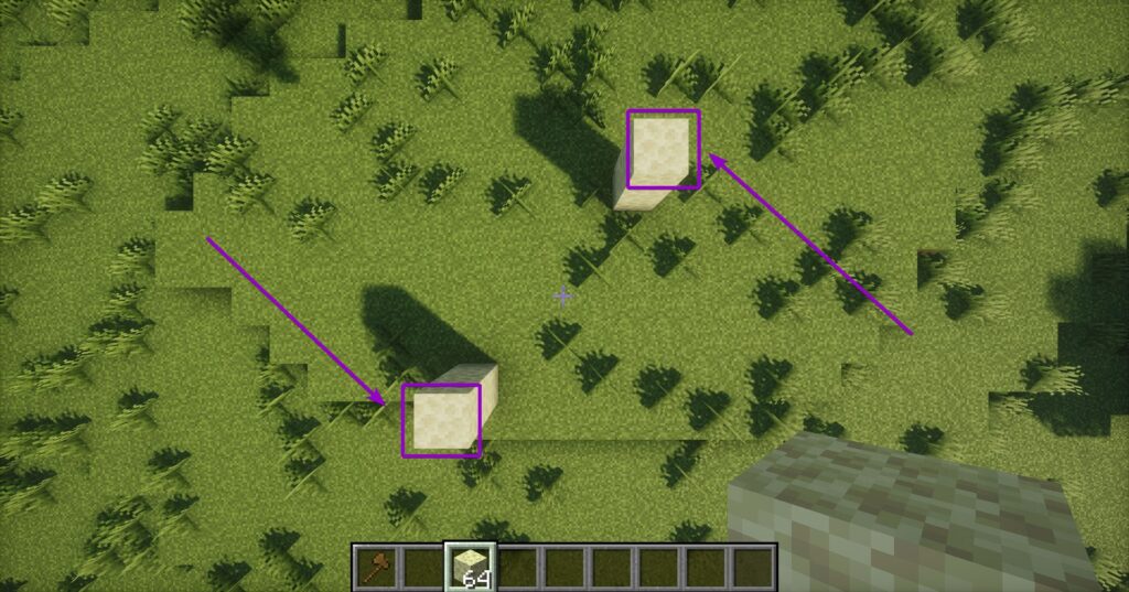 An aerial view of a player selecting two opposite blocks to create an invisible build area in WorldEdit