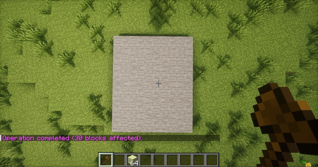 A large flat area of blocks instantly generating after a player uses the WorldEdit //set command